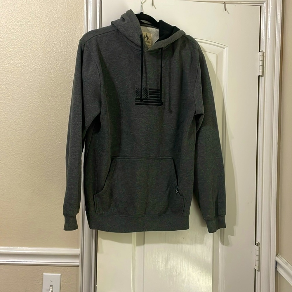 Bug wear size medium, gray, and color decal on back flag on front